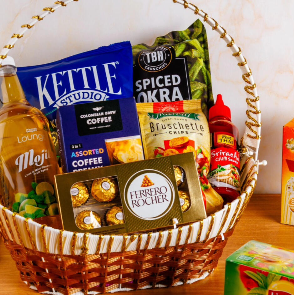 Luxury gift basket with Ferrero Rocher, Kettle Studio chips, and assorted snacks for corporate gifting